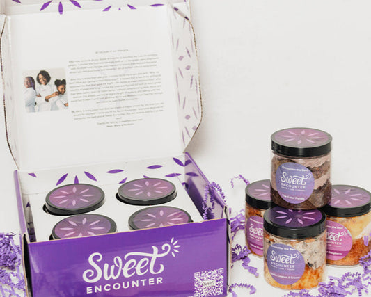 Sweet Encounter product packaging with jars and a box on a white background